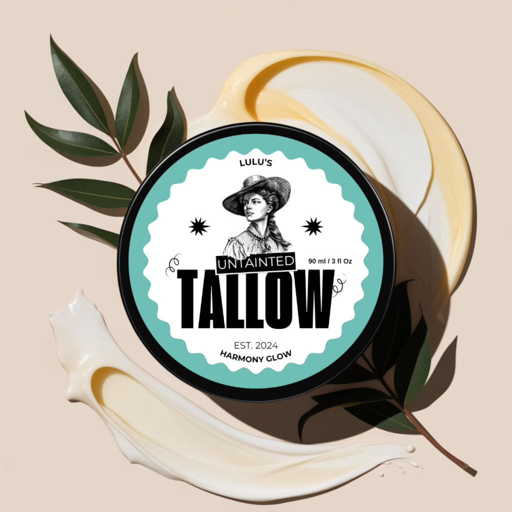 "90ml Harmony Glow Whipped Tallow Cream by Lulu's Untainted Tallow, for combination skin, featuring a vintage-inspired label with a portrait of a woman. The label reads 'UNTAINTED TALLOW' in bold with a turquoise border. The tin sits on a creamy swirl background with green leaves, emphasizing a natural and harmonious theme."
